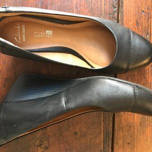 Clarks Brielle black leather wedge pumps